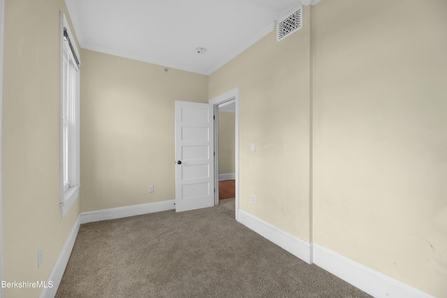 unfurnished bedroom with carpet flooring