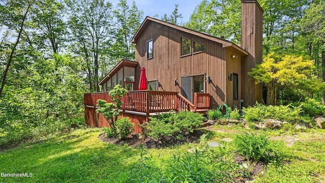 889 George Carter Rd, Becket, MA 01223 - back of house with a wooden deck and a chimney