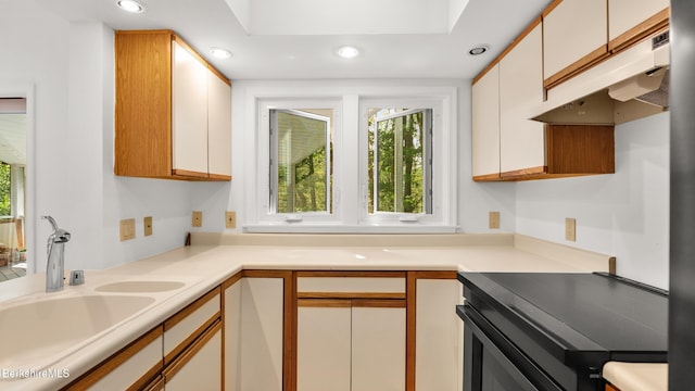 889 George Carter Rd, Becket, MA 01223 - kitchen with range, under cabinet range hood, healthy amount of natural light, light countertops, and recessed lighting