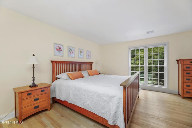 bedroom featuring light wood-type flooring