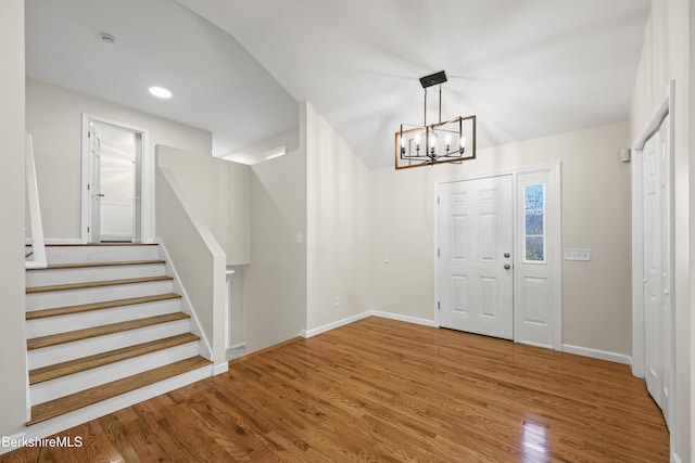 149 Wilshire Dr, Cheshire, MA 01225 - foyer entrance featuring an inviting chandelier, wood finished floors, stairs, baseboards, and recessed lighting