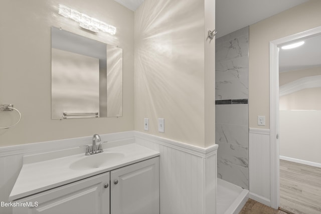 149 Wilshire Dr, Cheshire, MA 01225 - bathroom featuring a wainscoted wall, wood finished floors, vanity, and a tile shower