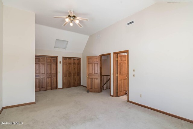 1166 Rannapo Rd, Sheffield, MA 01257 - unfurnished bedroom with two closets, carpet, high vaulted ceiling, baseboards, and a ceiling fan