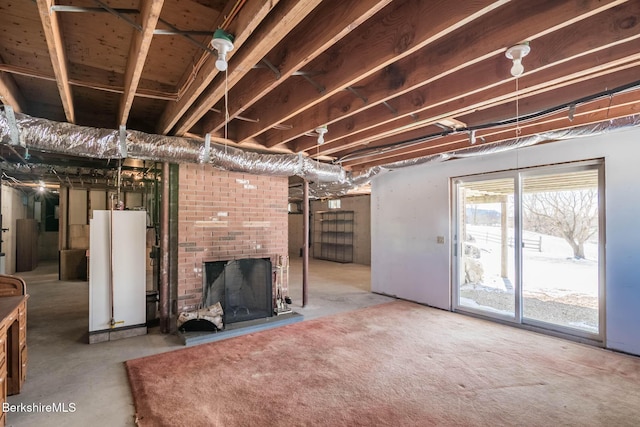 1166 Rannapo Rd, Sheffield, MA 01257 - below grade area featuring a brick fireplace and water heater