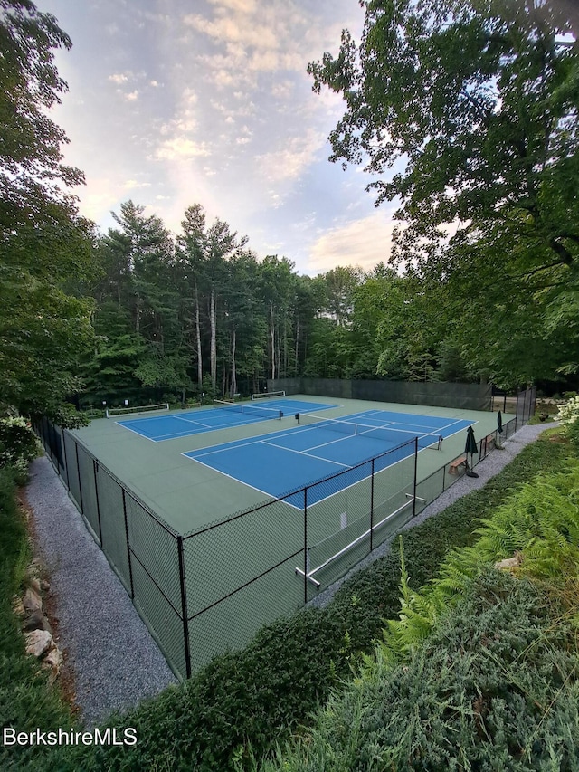 305 Shadow Ln, Sandisfield, MA 01255 - view of tennis court featuring a wooded view