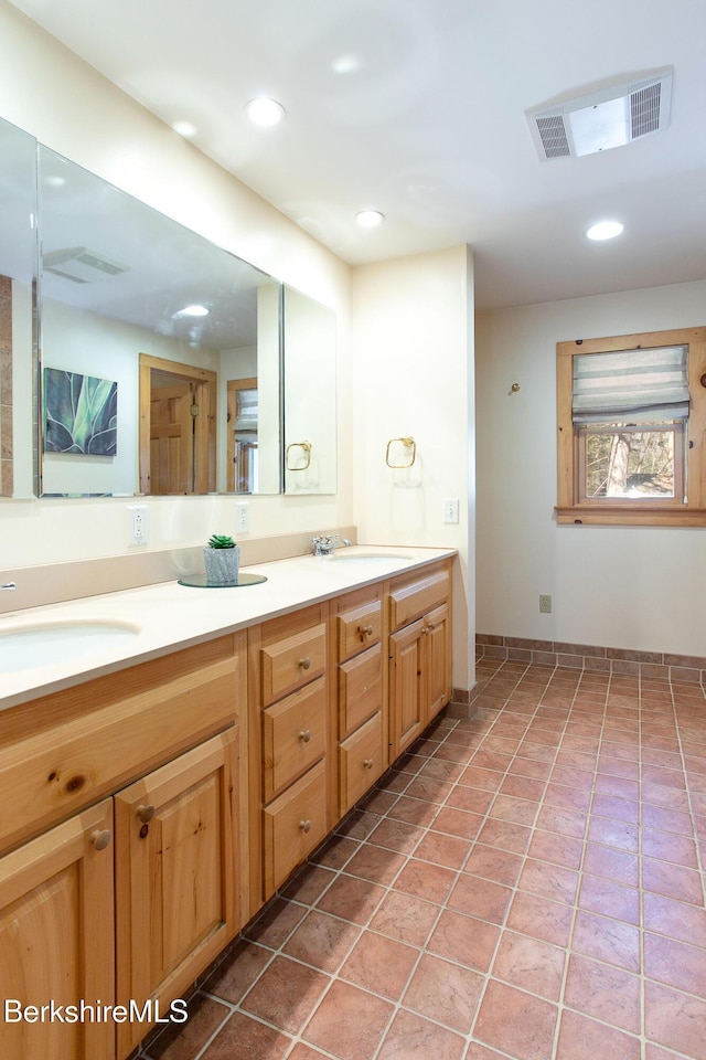 305 Shadow Ln, Sandisfield, MA 01255 - bathroom featuring double vanity and recessed lighting