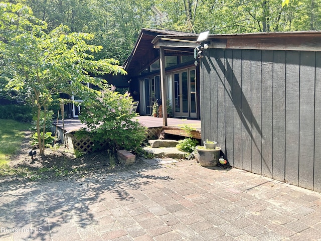 305 Shadow Ln, Sandisfield, MA 01255 - view of side of property featuring a deck, french doors, and a patio area