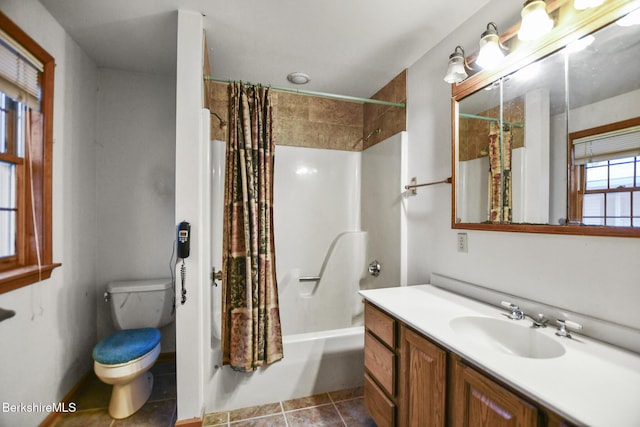 bathroom with toilet, vanity, shower / bath combination with curtain, and tile patterned floors