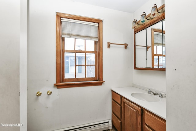 bathroom featuring a baseboard radiator and vanity