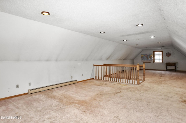 bonus room with carpet floors, a baseboard radiator, baseboards, and lofted ceiling