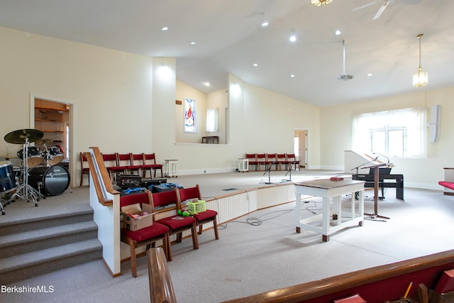 interior space featuring light carpet and lofted ceiling