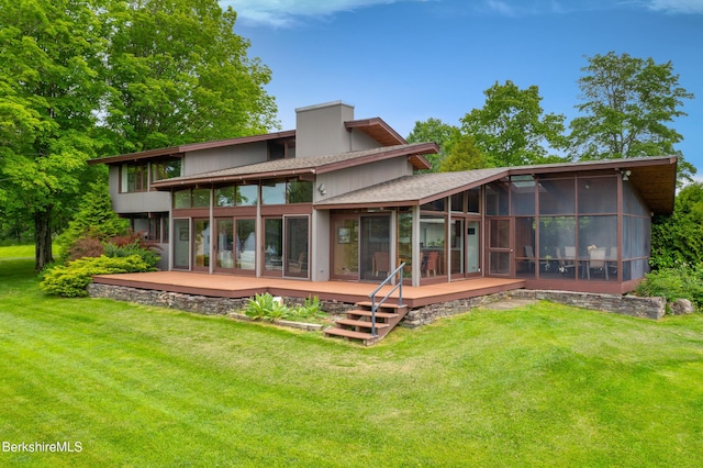 21 Kalliste Hl, Great Barrington, MA 01230 - back of house with a sunroom, a deck, and a lawn