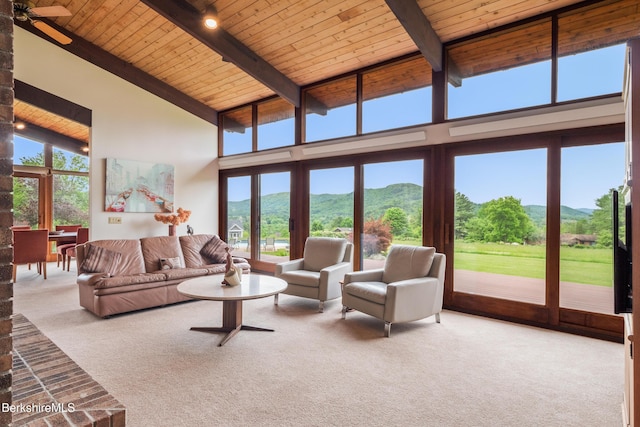21 Kalliste Hl, Great Barrington, MA 01230 - living area with carpet floors, wood ceiling with exposed beams, a mountain view, high vaulted ceiling, and ceiling fan