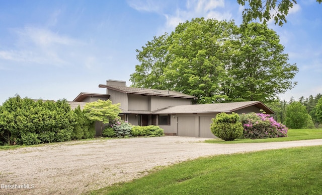 21 Kalliste Hl, Great Barrington, MA 01230 - mid-century home with driveway, a front lawn, and a garage