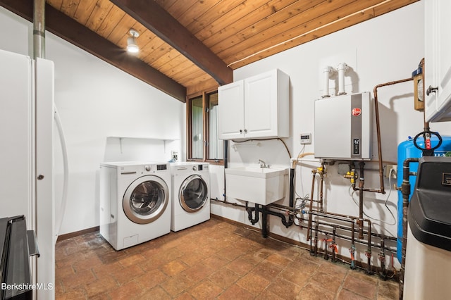 21 Kalliste Hl, Great Barrington, MA 01230 - laundry area with cabinet space, separate washer and dryer, tankless water heater, wood ceiling, and baseboards