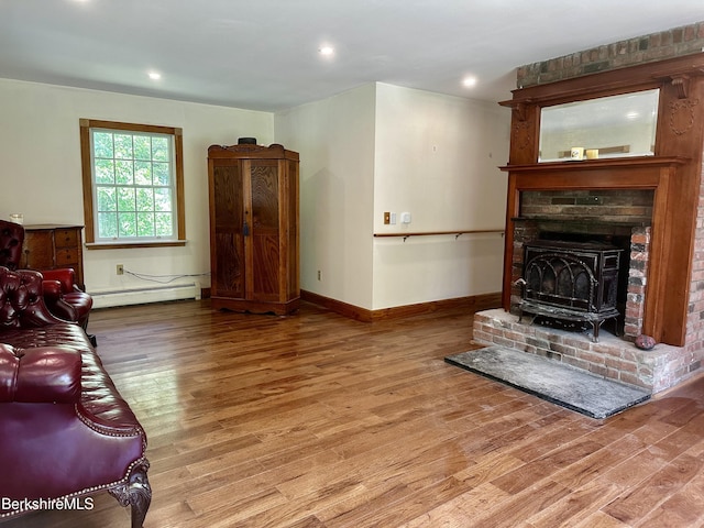 1689 E Windsor Rd, Windsor, MA 01270 - living area featuring baseboard heating, wood finished floors, and recessed lighting