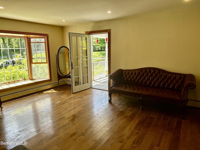 1689 E Windsor Rd, Windsor, MA 01270 - living area with a baseboard heating unit, hardwood / wood-style floors, and recessed lighting