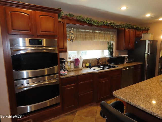 94 Gale Ave, Pittsfield, MA 01201 - kitchen with appliances with stainless steel finishes, light tile patterned floors, light stone countertops, and recessed lighting