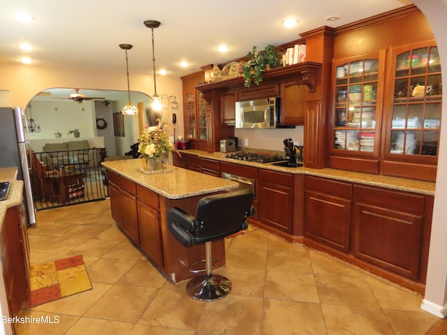 94 Gale Ave, Pittsfield, MA 01201 - kitchen featuring stainless steel appliances, decorative light fixtures, a center island, glass insert cabinets, and ornamental molding