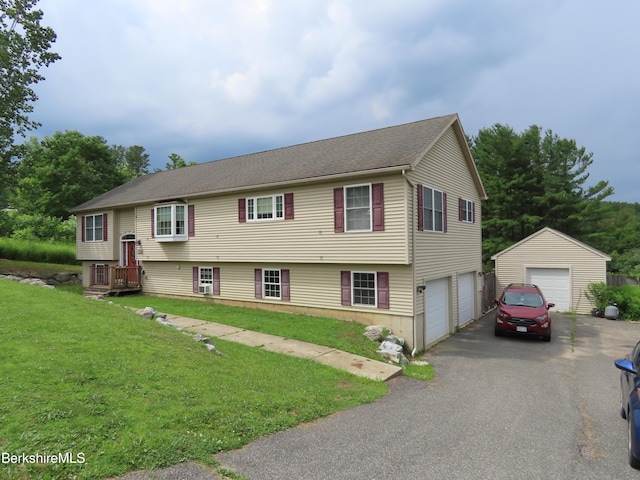 94 Gale Ave, Pittsfield, MA 01201 - raised ranch featuring a front yard and an outbuilding