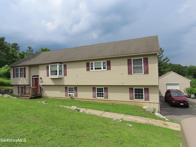 94 Gale Ave, Pittsfield, MA 01201 - bi-level home featuring asphalt driveway, a front lawn, a garage, and cooling unit