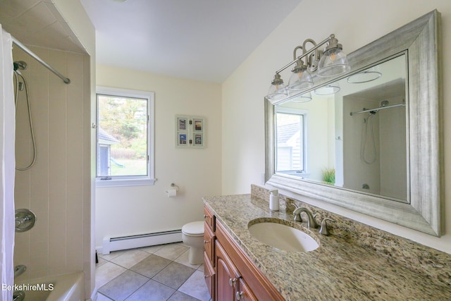 bathroom featuring tile patterned floors, vanity, toilet, and a baseboard radiator