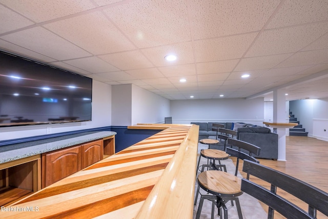 bar with a paneled ceiling