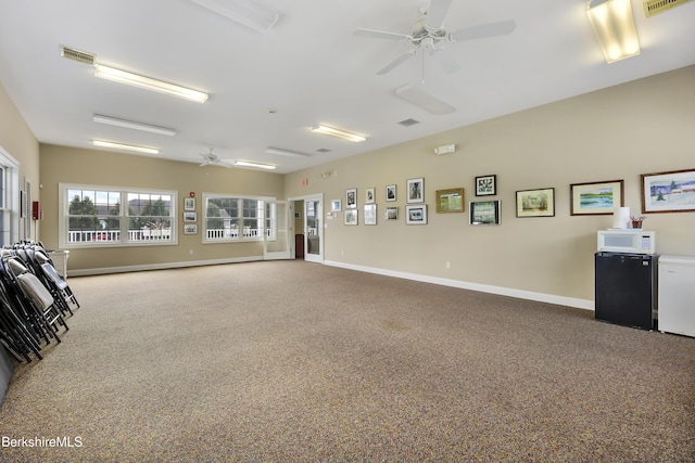 interior space featuring ceiling fan