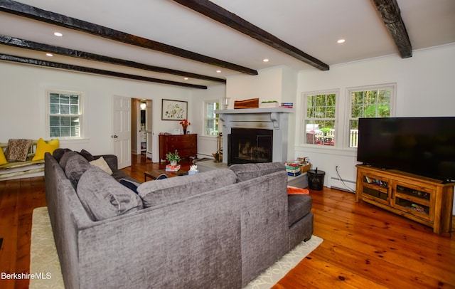 162 Ymca Rd, Becket, MA 01223 - living room with a baseboard radiator, a fireplace, wood-type flooring, beam ceiling, and recessed lighting