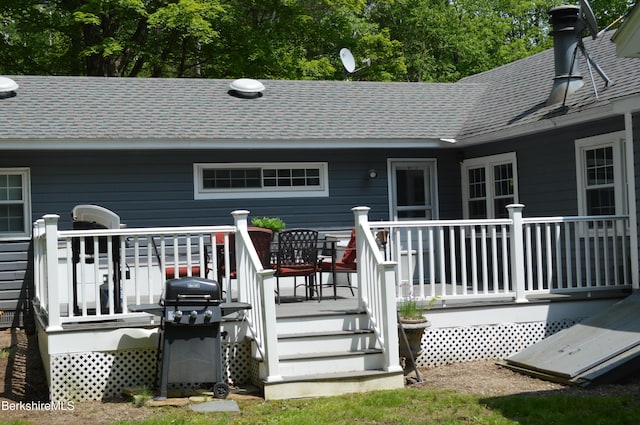 162 Ymca Rd, Becket, MA 01223 - back of property featuring a shingled roof and a wooden deck