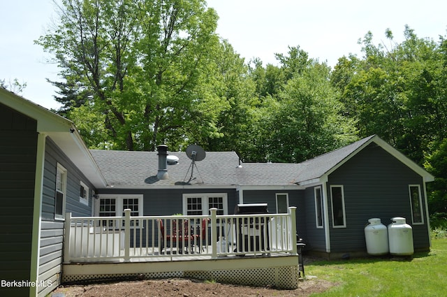 162 Ymca Rd, Becket, MA 01223 - rear view of house with roof with shingles and a wooden deck