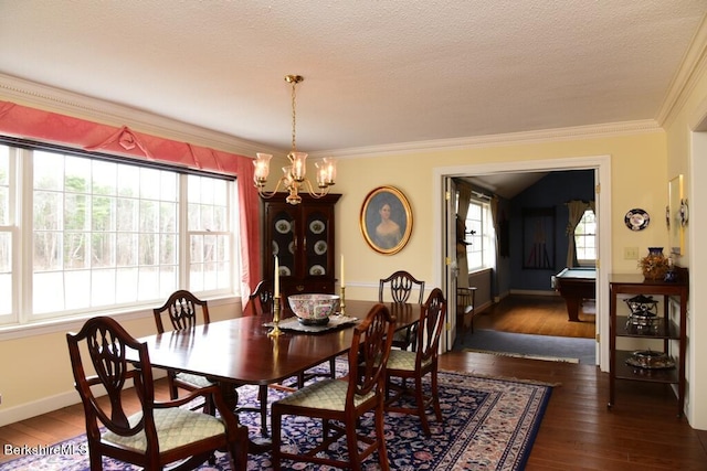 dining room featuring a chandelier, dark wood-type flooring, crown molding, and pool table