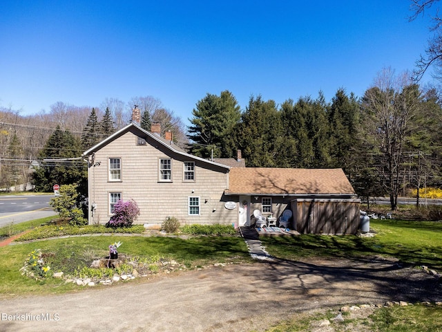 3 Lake Buel Rd, Great Barrington, MA 01230 - traditional-style house featuring a chimney and a front lawn