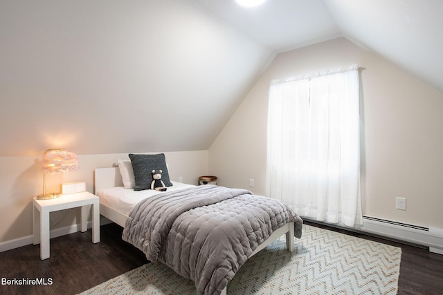 bedroom featuring a baseboard heating unit, lofted ceiling, and dark wood-type flooring