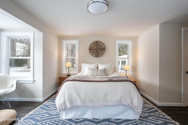 bedroom featuring dark hardwood / wood-style flooring