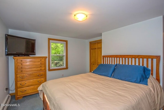 49 Bryant Rd, Otis, MA 01253 - carpeted bedroom featuring a baseboard heating unit and a closet