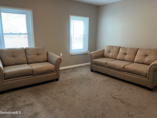 94 John St, Pittsfield, MA 01201 - living area with carpet and baseboards