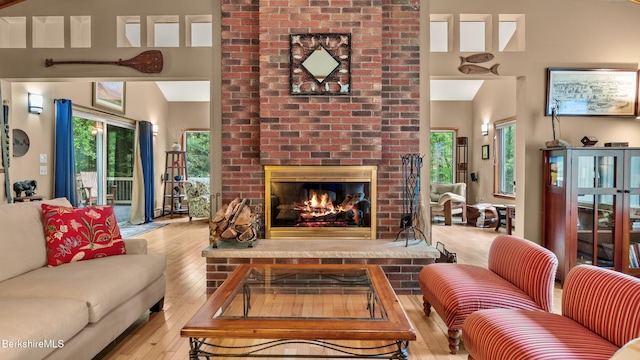 505 Kirchner Rd, Dalton, MA 01226 - living area featuring hardwood / wood-style floors, a fireplace, and a high ceiling