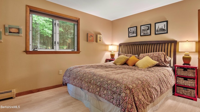505 Kirchner Rd, Dalton, MA 01226 - bedroom with a baseboard radiator, wood finished floors, and baseboards