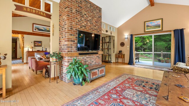 505 Kirchner Rd, Dalton, MA 01226 - living area featuring high vaulted ceiling, wood-type flooring, and beam ceiling