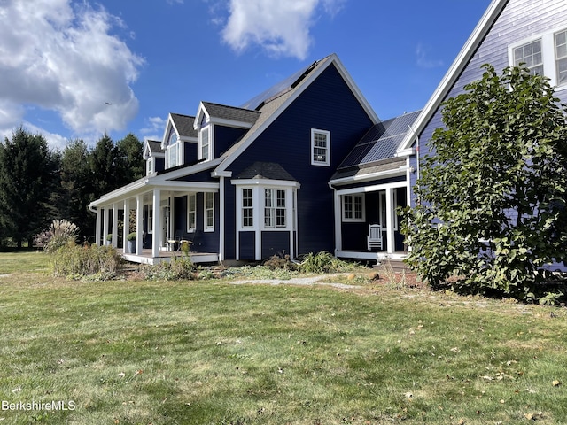 exterior space with a lawn and covered porch