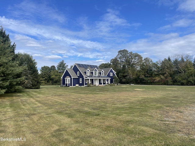 view of front of home with a front yard