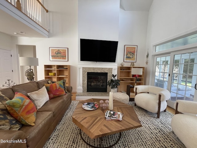 living room featuring a high ceiling