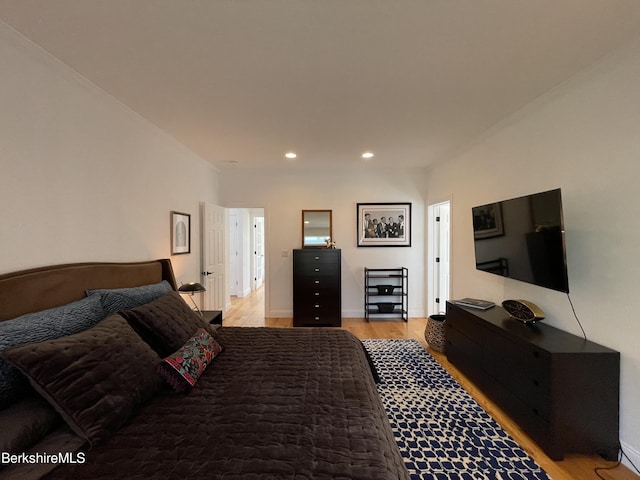 bedroom featuring light hardwood / wood-style floors