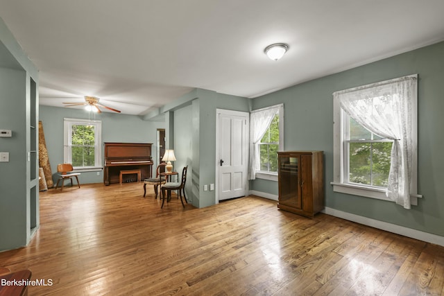 9 High St, Lenox, MA 01240 - living area featuring wood-type flooring, ceiling fan, and baseboards
