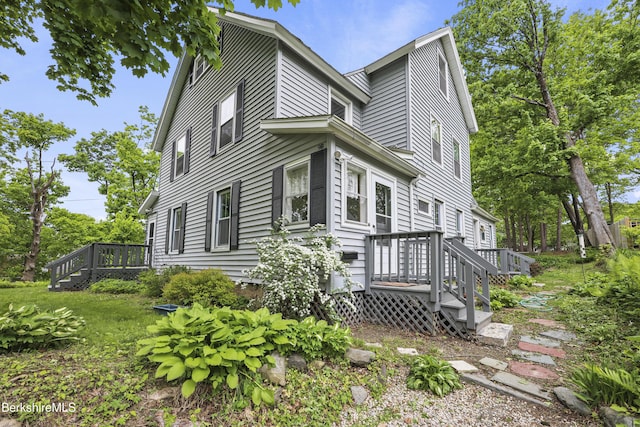 9 High St, Lenox, MA 01240 - view of side of home with a deck