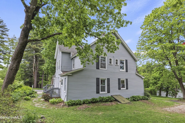 9 High St, Lenox, MA 01240 - view of side of home with a yard