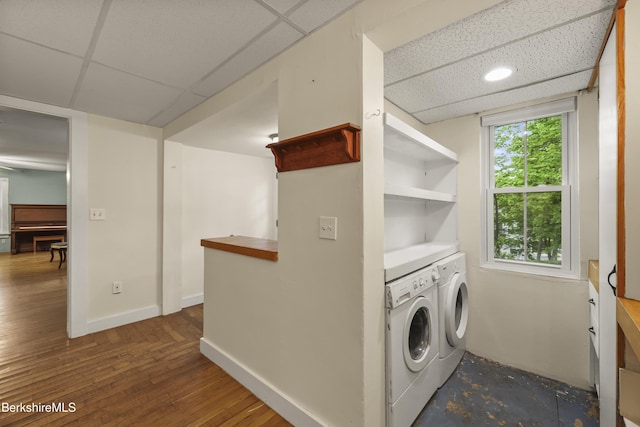 9 High St, Lenox, MA 01240 - washroom featuring washer and clothes dryer, wood finished floors, and baseboards
