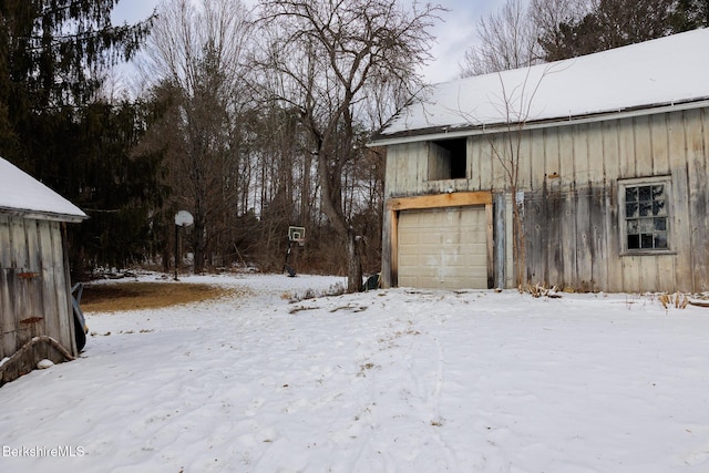 view of snow covered garage