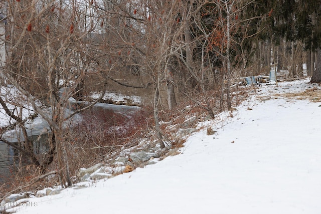 view of snow covered land